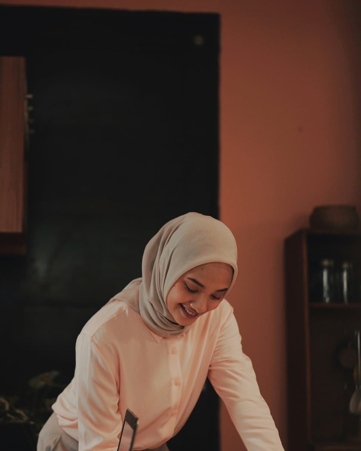 Professional black hijab with composed urban styling